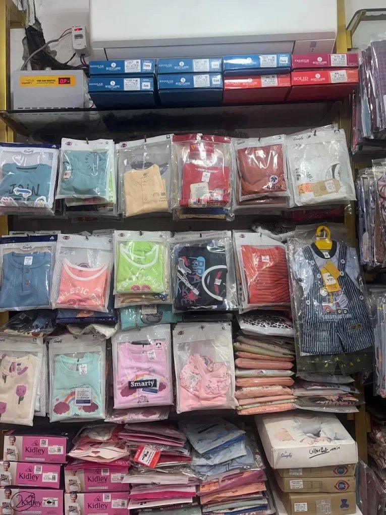 Kids' t-shirts and sets on the kids wall